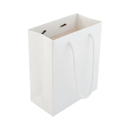 Vogue Rectangle White Paper Small Shopping and Take Out Bag - Glossy, Rope Handles - 6 1/2" x 3 1/4" x 7 1/2" - 10 count box
