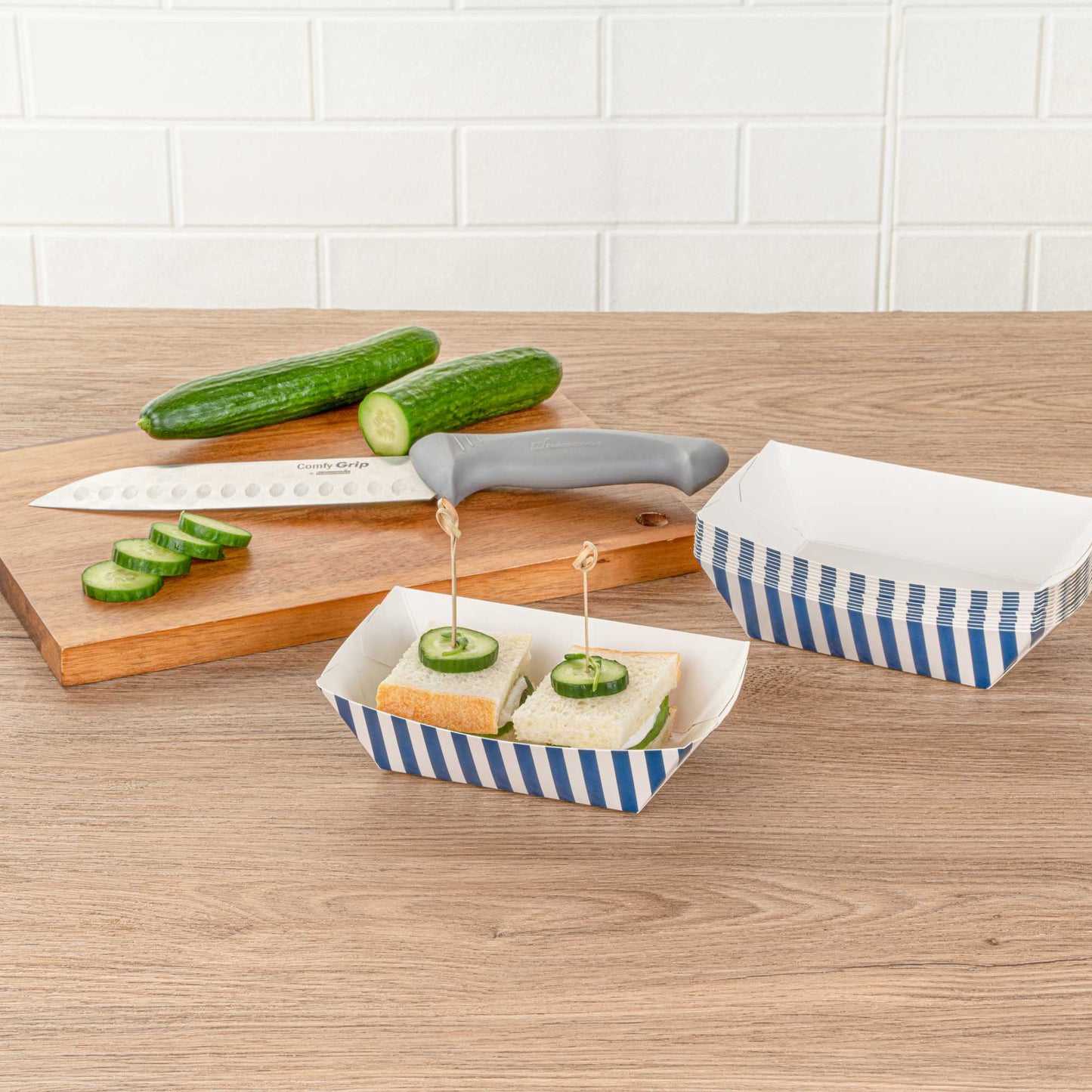 Bio Tek 1/2 lb Blue and White Stripe Paper #50 Food Tray / Boat - 4 1/4" x 2 3/4" x 1 1/2" - 400 count box