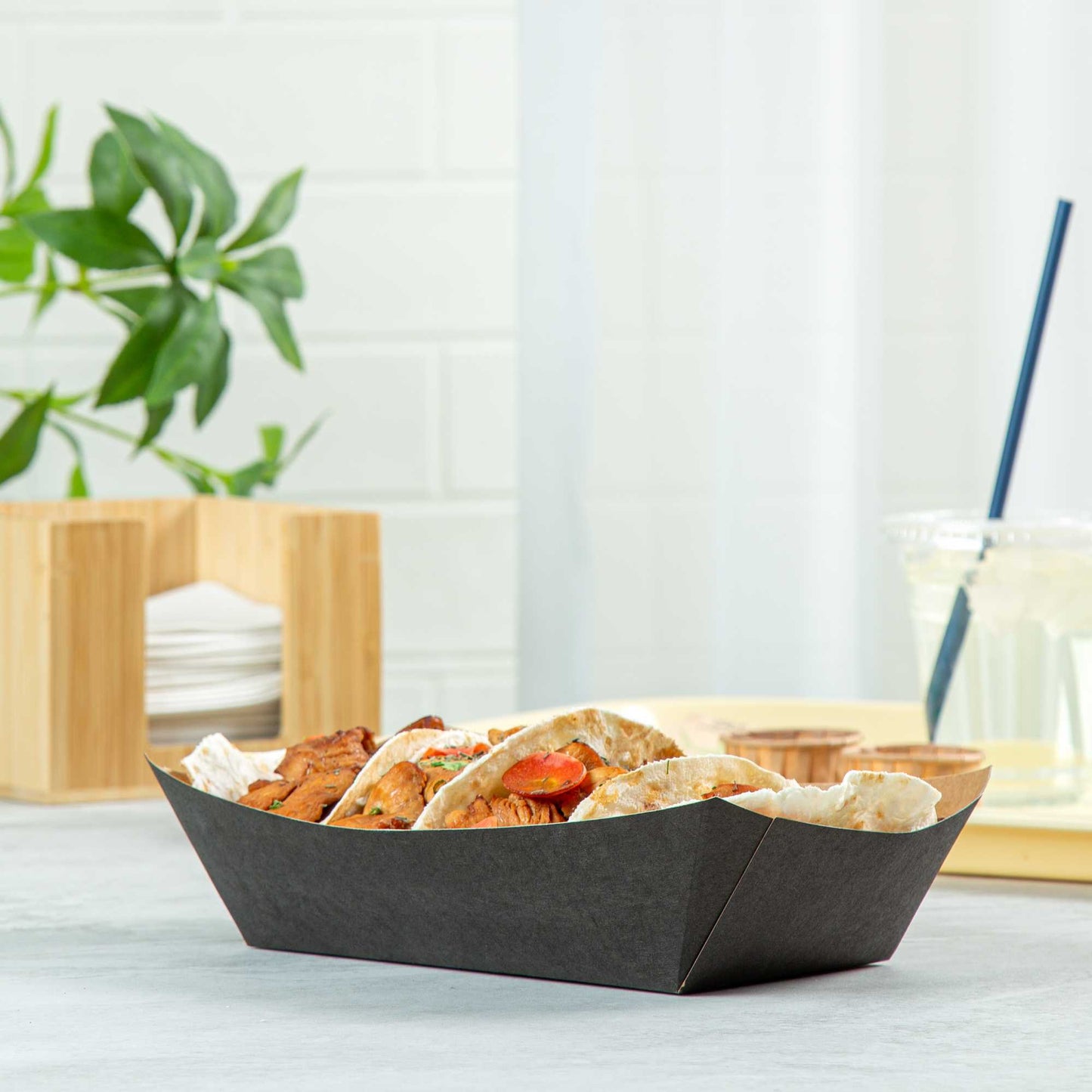 Bio Tek 2 lb Black Paper #200 Food Tray / Boat - 6 1/2" x 3 3/4" x 2 1/4" - 50 count box
