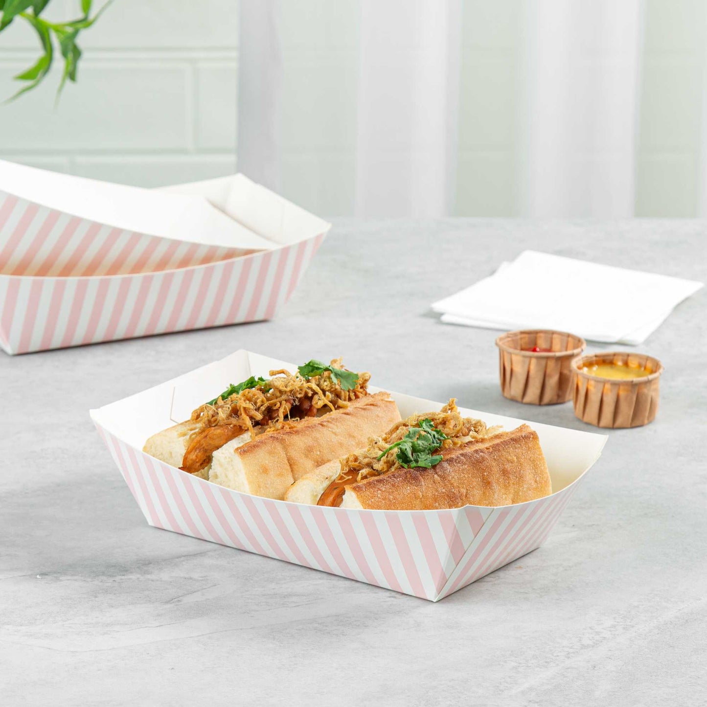 Bio Tek 2 lb Pink and White Stripe Paper #200 Food Tray / Boat - 6 1/2" x 3 3/4" x 2 1/4" - 50 count box