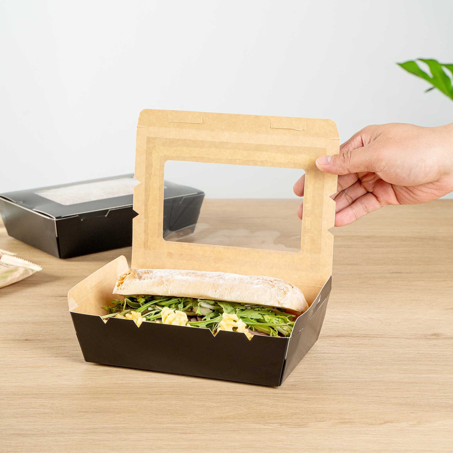 Cafe Vision 42 oz Black Paper Medium Take Out Container - Hinge Lock - 8" x 5 1/2" x 2" - 50 count box
