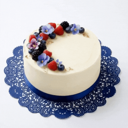 Pastry Tek Round Navy Blue Paper Doilies - Lace - 12" x 12" - 100 count box