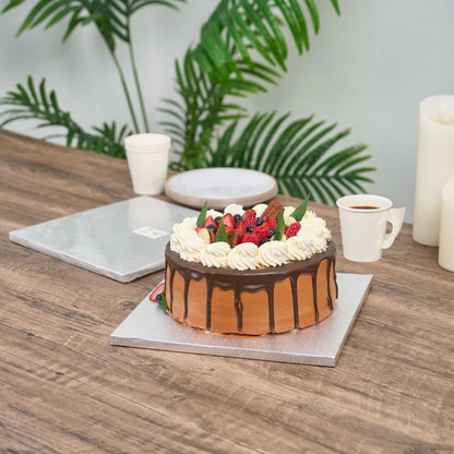 Pastry Tek Square Metallic Silver Cardboard Cake Drum Board - Covered Edge - 10" x 10" x 1/2" - 1 count box