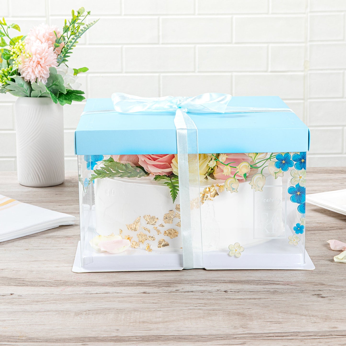Sweet Vision Square Clear Plastic Cake Box - Blue Lid and White Base, Blue Ribbon, Flower Accent - 10" x 10" x 8 1/4" - 10 count box