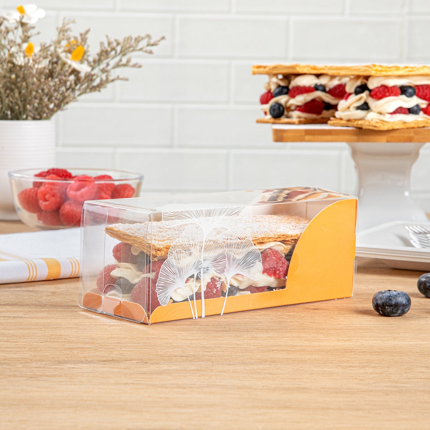 Sweet Vision Rectangle Clear Plastic Eclair Box - Orange Paper Sleeve, Leaf Accent - 7" x 2 1/2" x 2 1/2" - 100 count box
