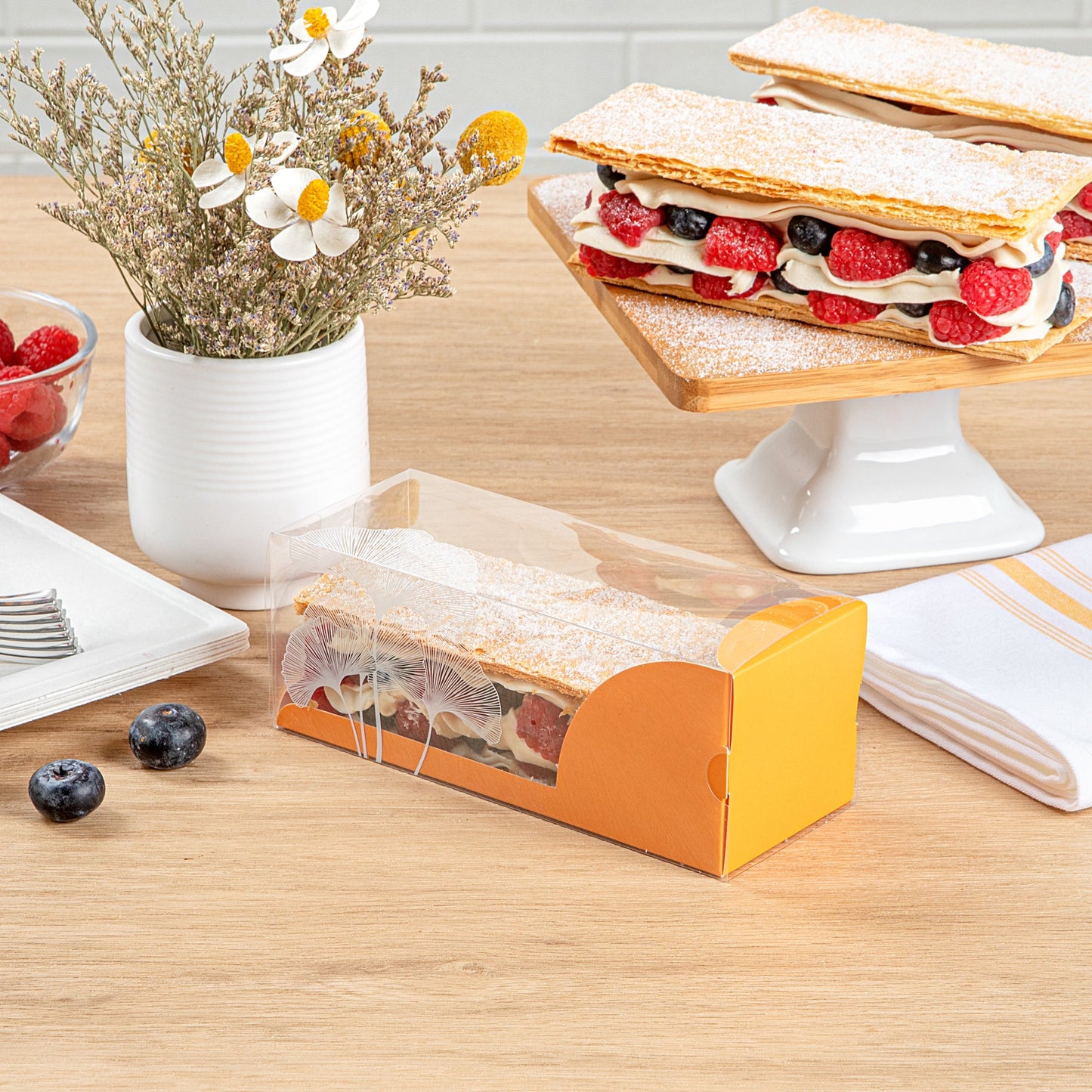Sweet Vision Rectangle Clear Plastic Eclair Box - Orange Paper Sleeve, Leaf Accent - 7" x 2 1/2" x 2 1/2" - 100 count box