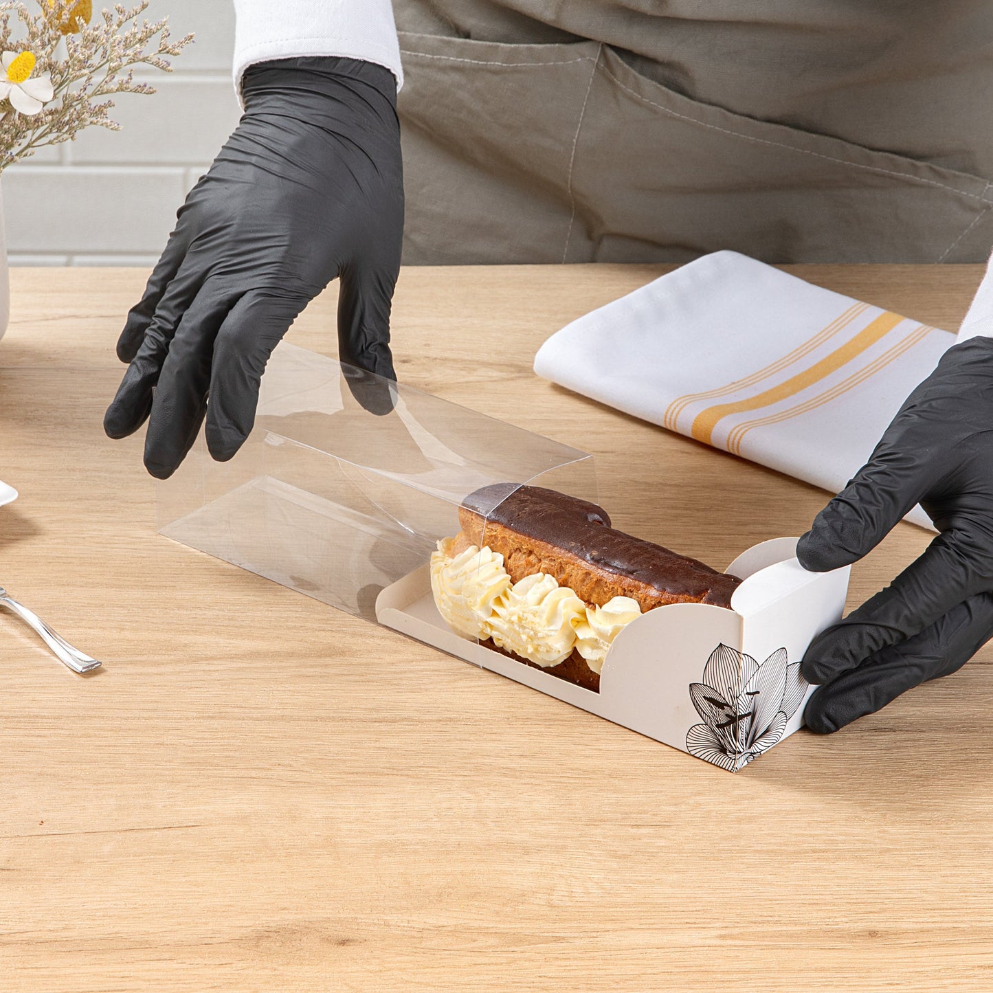 Sweet Vision Rectangle Clear Plastic Eclair Box - White Paper Sleeve, Lotus Accent - 7" x 2 1/2" x 2 1/2" - 100 count box