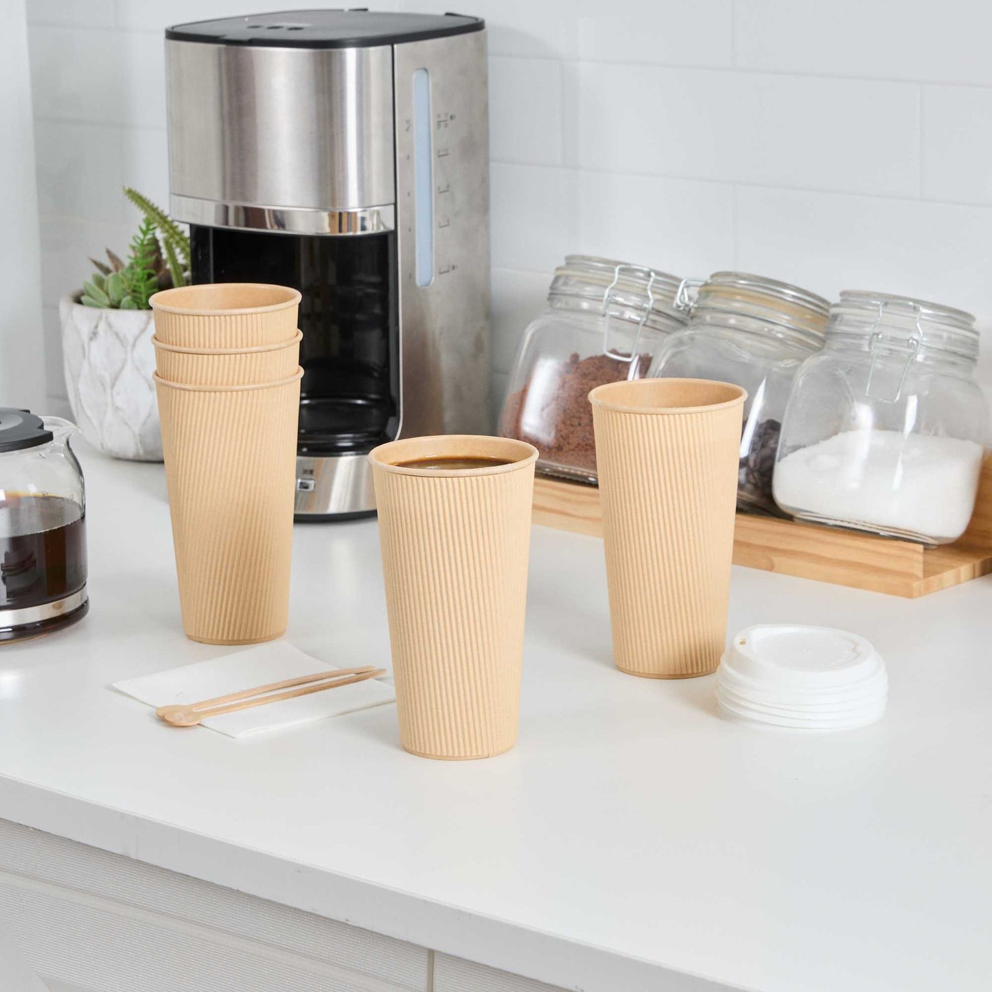 Restpresso 20 oz Kraft Paper Coffee Cup - Ripple Wall - 3 1/2" x 3 1/2" x 6 1/4" - 250 count box