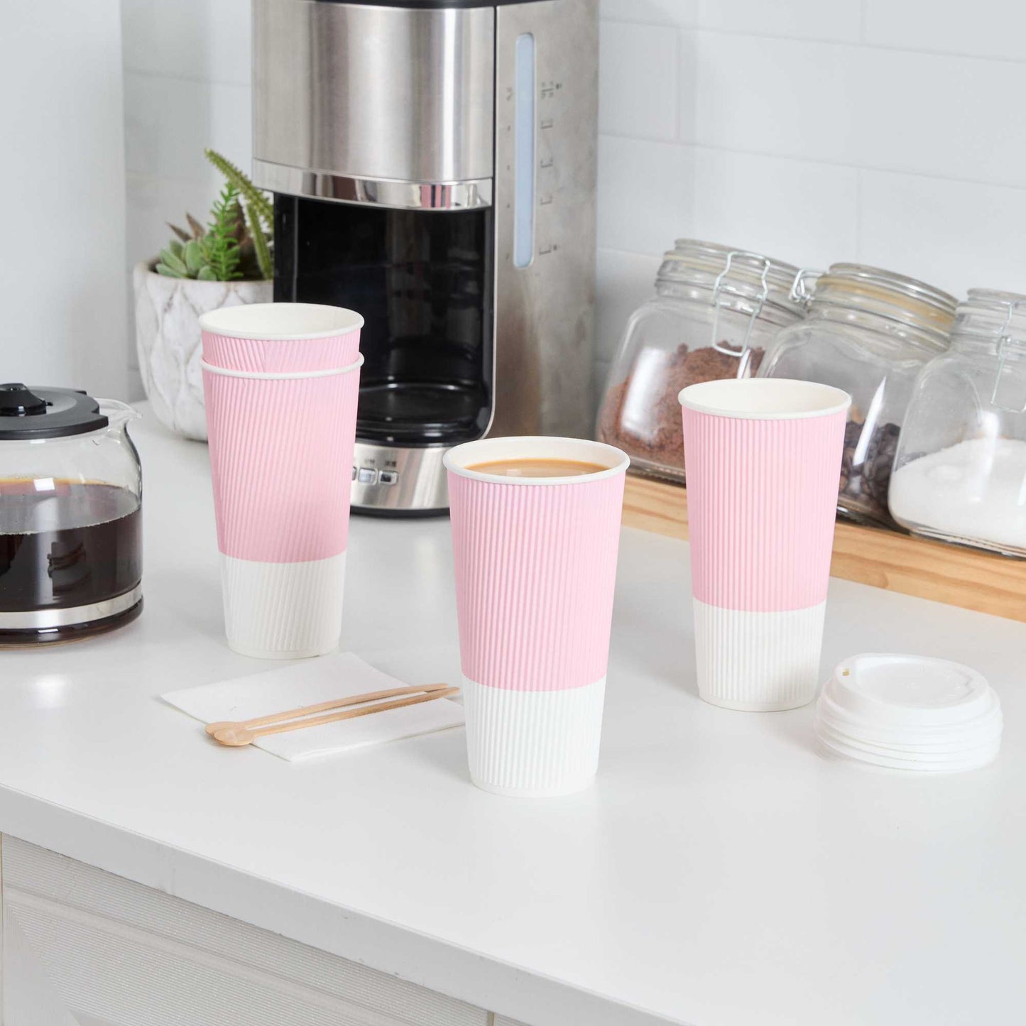 Restpresso 20 oz Light Pink Paper Coffee Cup - Ripple Wall - 3 1/2" x 3 1/2" x 6 1/4" - 250 count box