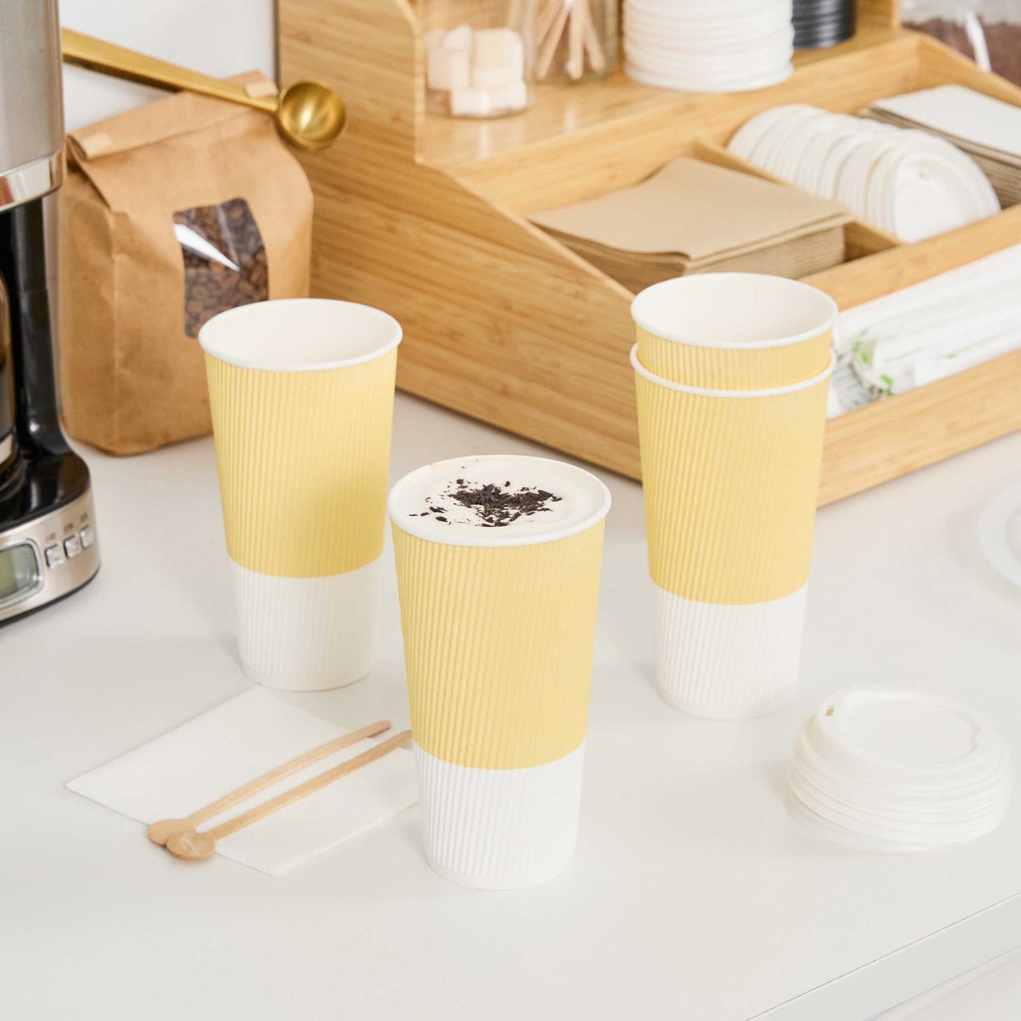 Restpresso 20 oz Light Yellow Paper Coffee Cup - Ripple Wall - 3 1/2" x 3 1/2" x 6 1/4" - 10 count box