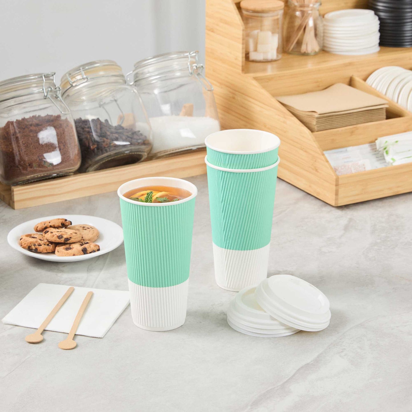 Restpresso 20 oz Light Green Paper Coffee Cup - Ripple Wall - 3 1/2" x 3 1/2" x 6 1/4" - 10 count box