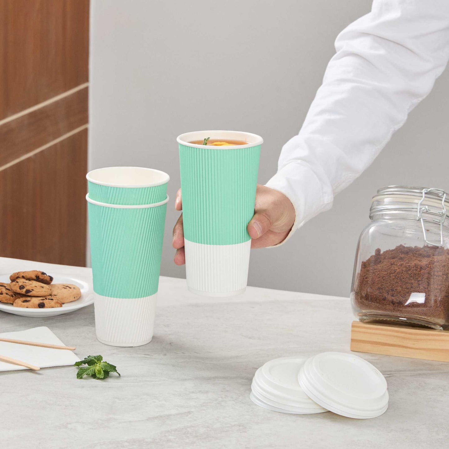 Restpresso 20 oz Light Green Paper Coffee Cup - Ripple Wall - 3 1/2" x 3 1/2" x 6 1/4" - 10 count box