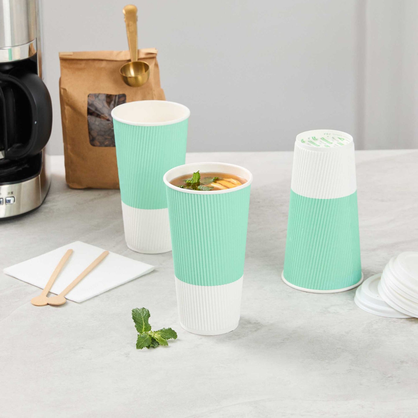 Restpresso 20 oz Light Green Paper Coffee Cup - Ripple Wall - 3 1/2" x 3 1/2" x 6 1/4" - 10 count box