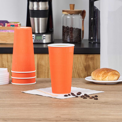 Restpresso 20 oz Tangerine Paper Coffee Cup - Ripple Wall - 3 1/2" x 3 1/2" x 6 1/4" - 250 count box