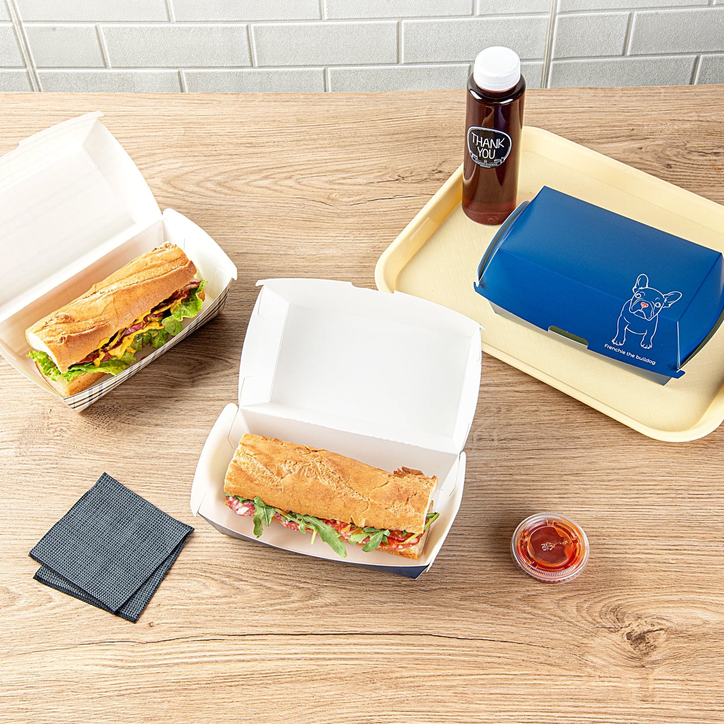 Bio Tek Rectangle Frenchie Paper Hot Dog / Sandwich Clamshell Container - 6 3/4" x 3 1/2" x 3 1/2" - 100 count box