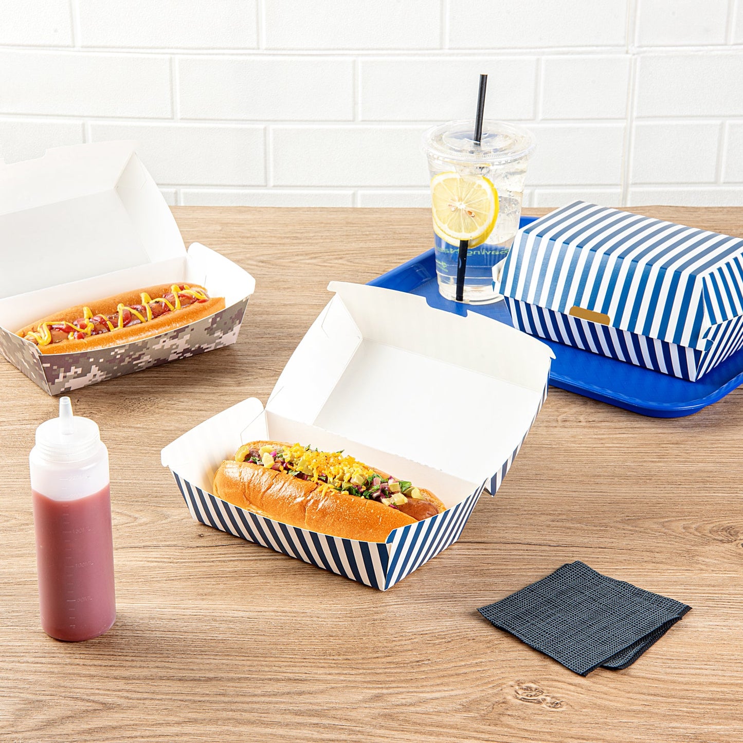 Bio Tek Rectangle Blue and White Stripe Paper Hot Dog / Sandwich Clamshell Container - 6 3/4" x 3 1/2" x 3 1/2" - 100 count box
