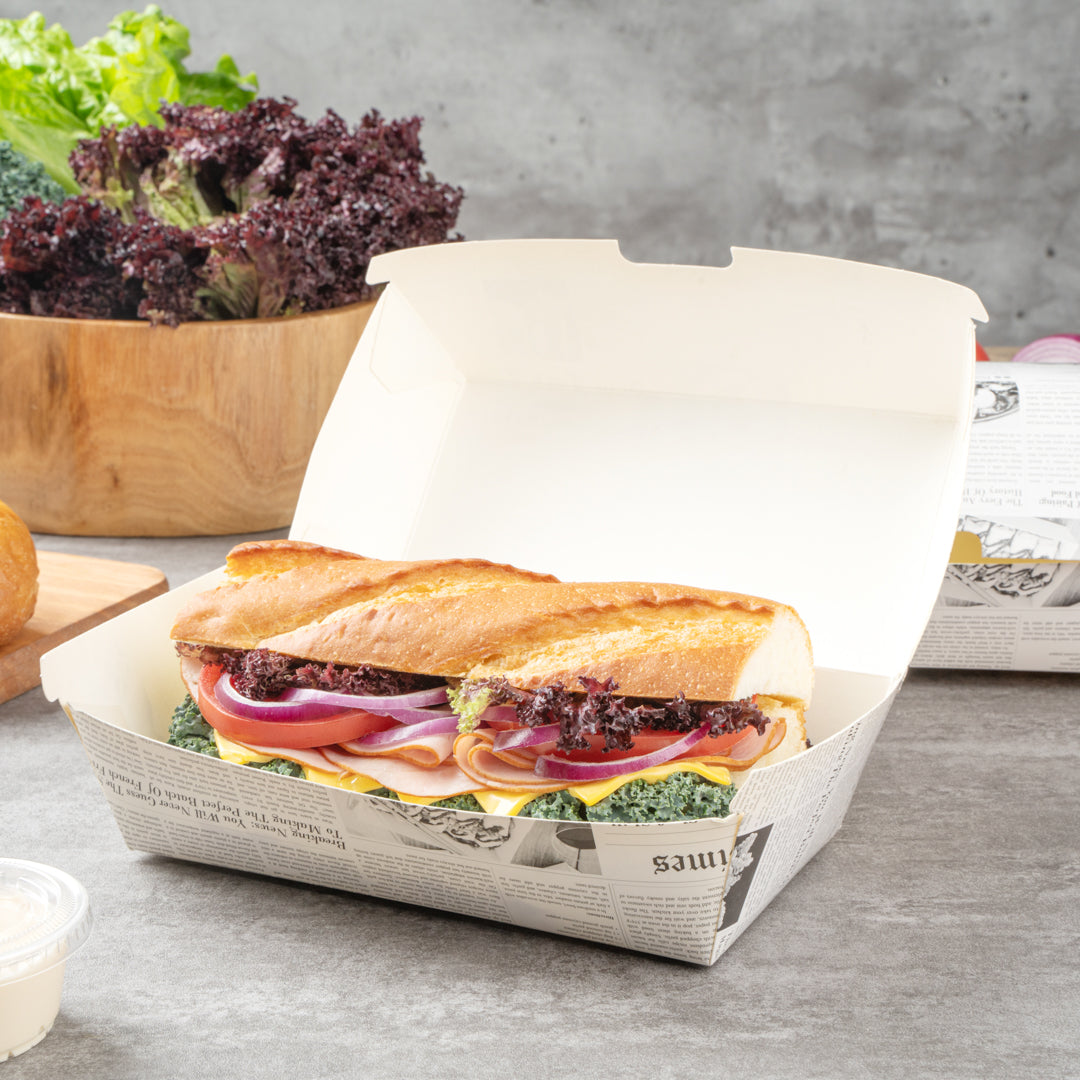 Bio Tek Rectangle Newsprint Paper Hot Dog / Sandwich Clamshell Container - 6 3/4" x 3 1/2" x 3 1/2" - 100 count box