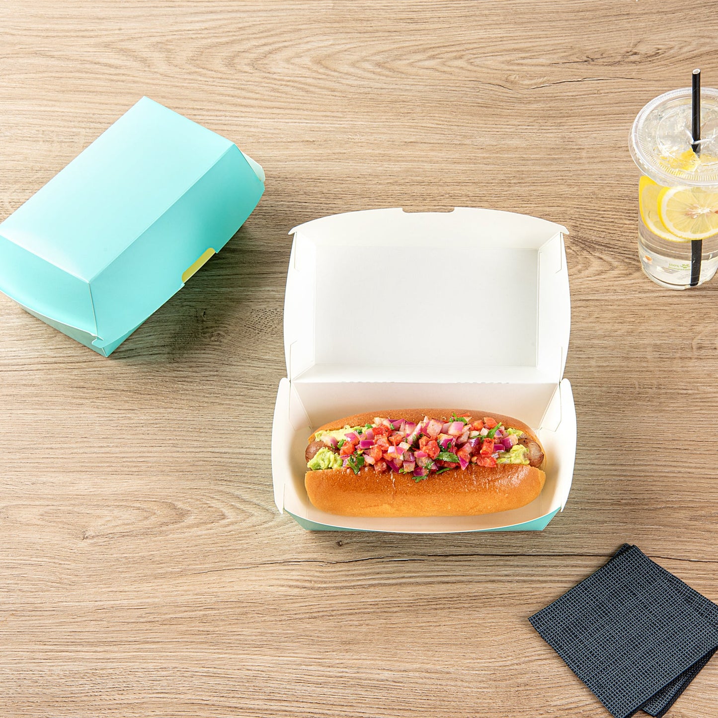 Bio Tek Rectangle Turquoise Paper Hot Dog / Sandwich Clamshell Container - 6 3/4" x 3 1/2" x 3 1/2" - 100 count box