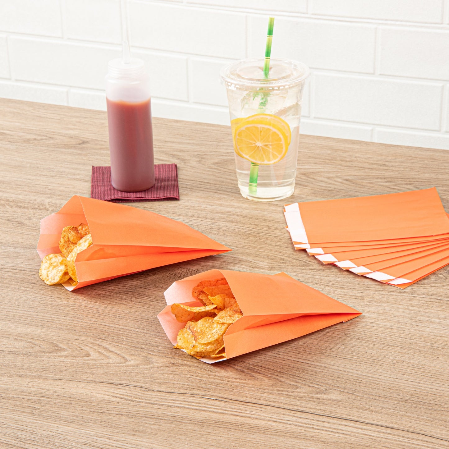 Bag Tek Tangerine Orange Paper French Fry / Snack Bag - 4 1/4" x 1 1/2" x 6 1/4" - 100 count box