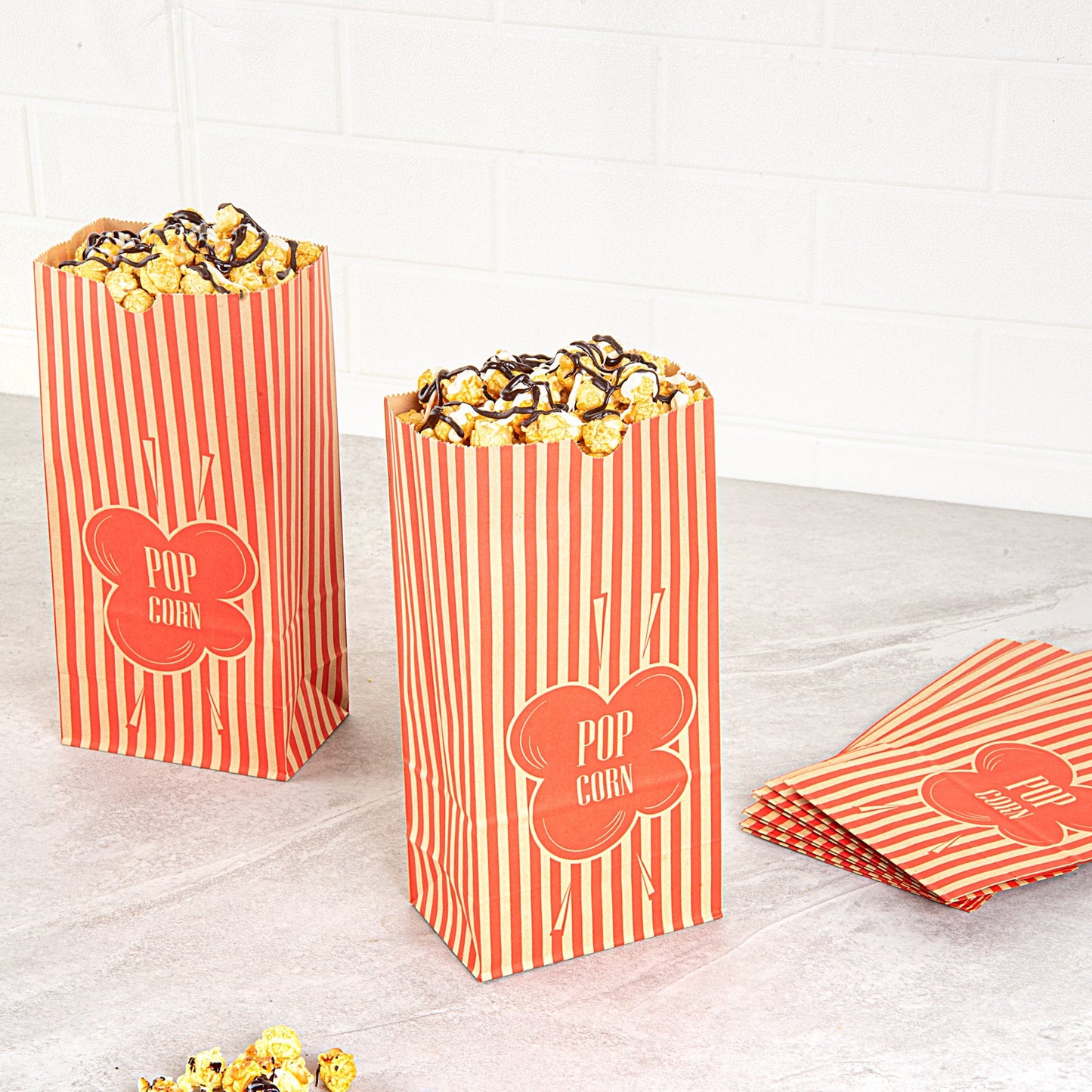 Bag Tek 1 oz Red and Kraft Paper Popcorn Bag - 4 1/4" x 2 1/4" x 9 1/2" - 100 count box