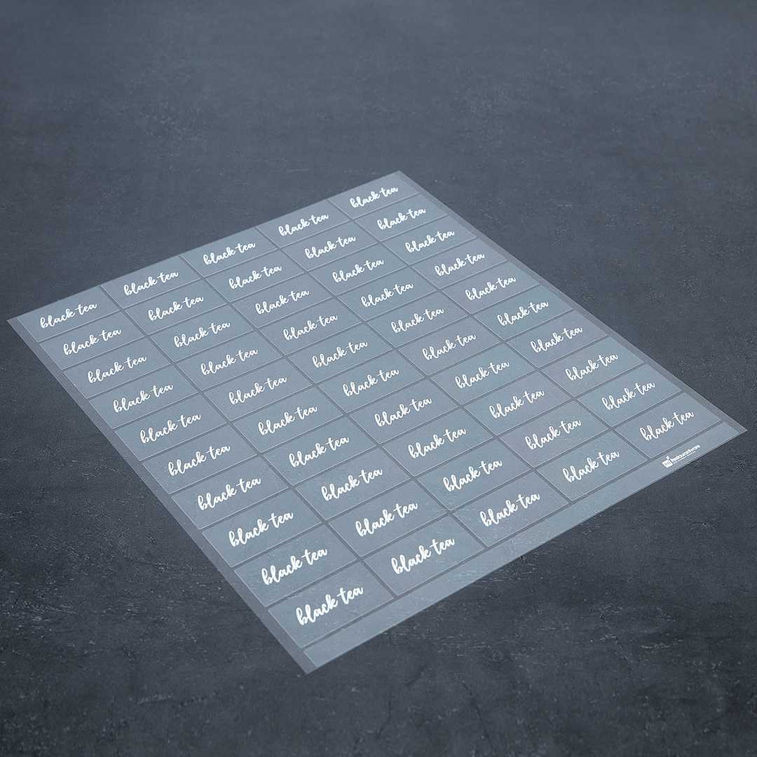 Label Tek Plastic Black Tea Label - Clear with White Font, Water-Resistant - 2" x 1" - 100 count box
