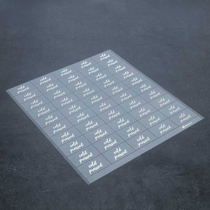Label Tek Plastic Cold Pressed Label - Clear with White Font, Water-Resistant - 2" x 1" - 100 count box