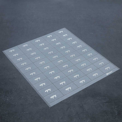 Label Tek Plastic Enjoy Label - Clear with White Font, Water-Resistant - 2" x 1" - 100 count box