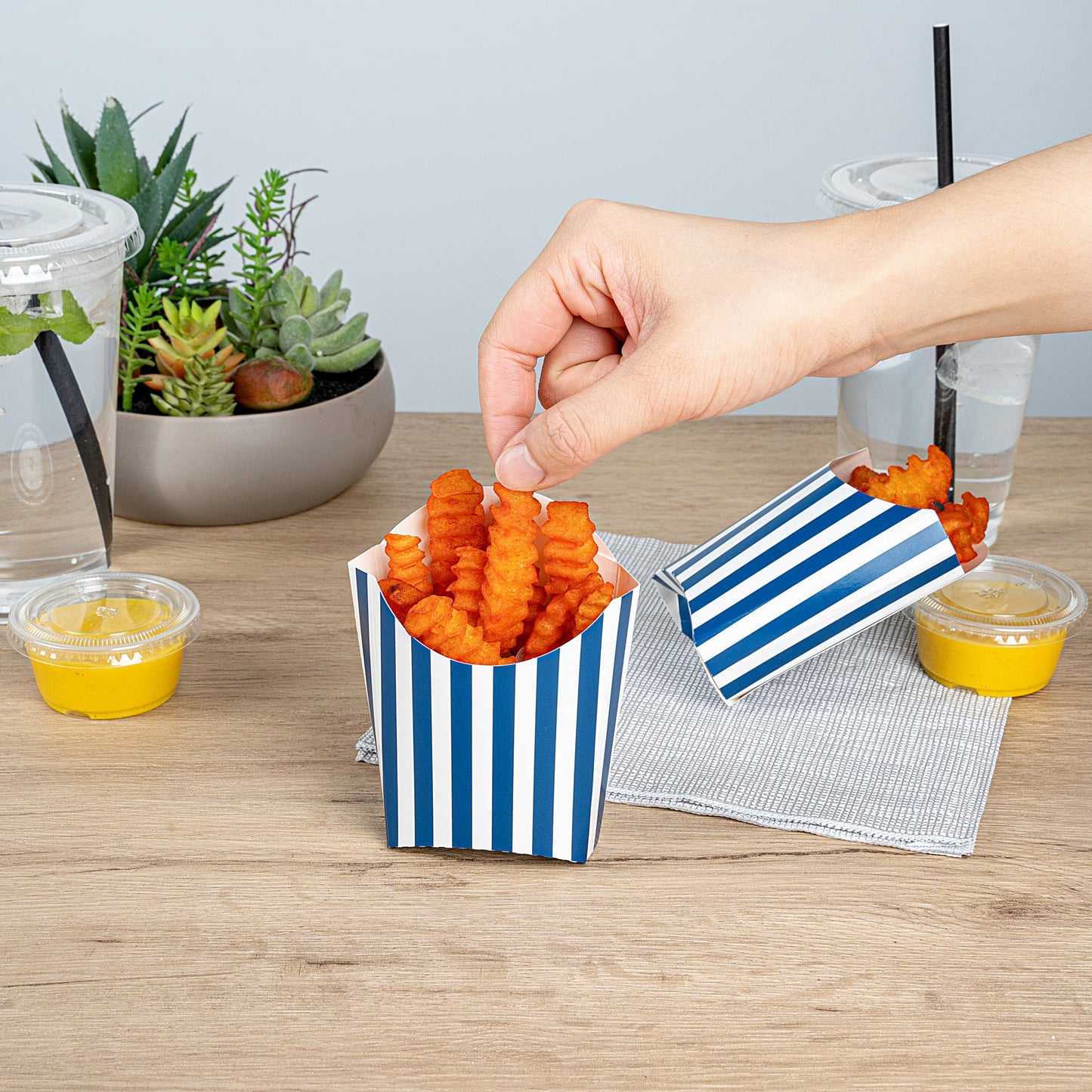 Bio Tek 2 oz Blue and White Stripe Paper Fry Cup / Snack Container - 4" x 2 3/4" x 3 1/2" - 100 count box