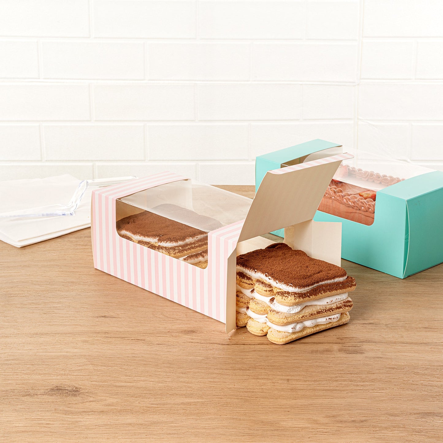 Pastry Tek Pink and White Stripe Paper Pastry / Cake Box - with Window - 9 3/4" x 4 3/4" x 4" - 100 count box