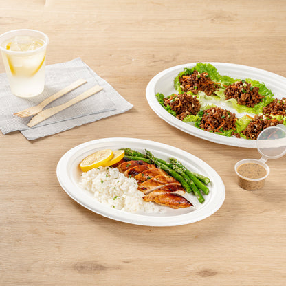 Pulp Safe No PFAS Added Oval White Sugarcane / Bagasse Medium Plate - Home Compostable - 10 1/2" x 7 3/4" x 3/4" - 100 count box