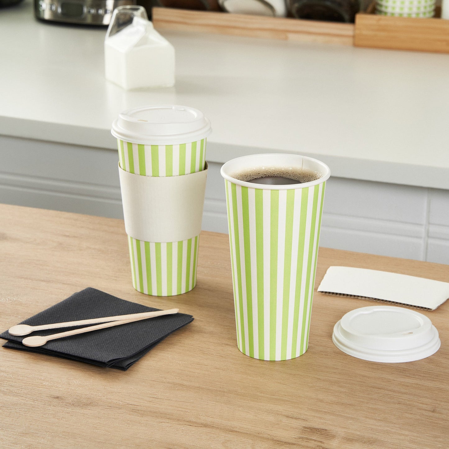 Restpresso 20 oz Green and White Stripe Paper Single Wall Coffee Cup - with White Lid - 3 1/2"x 3 1/2"x 6 1/2" - 20 count box