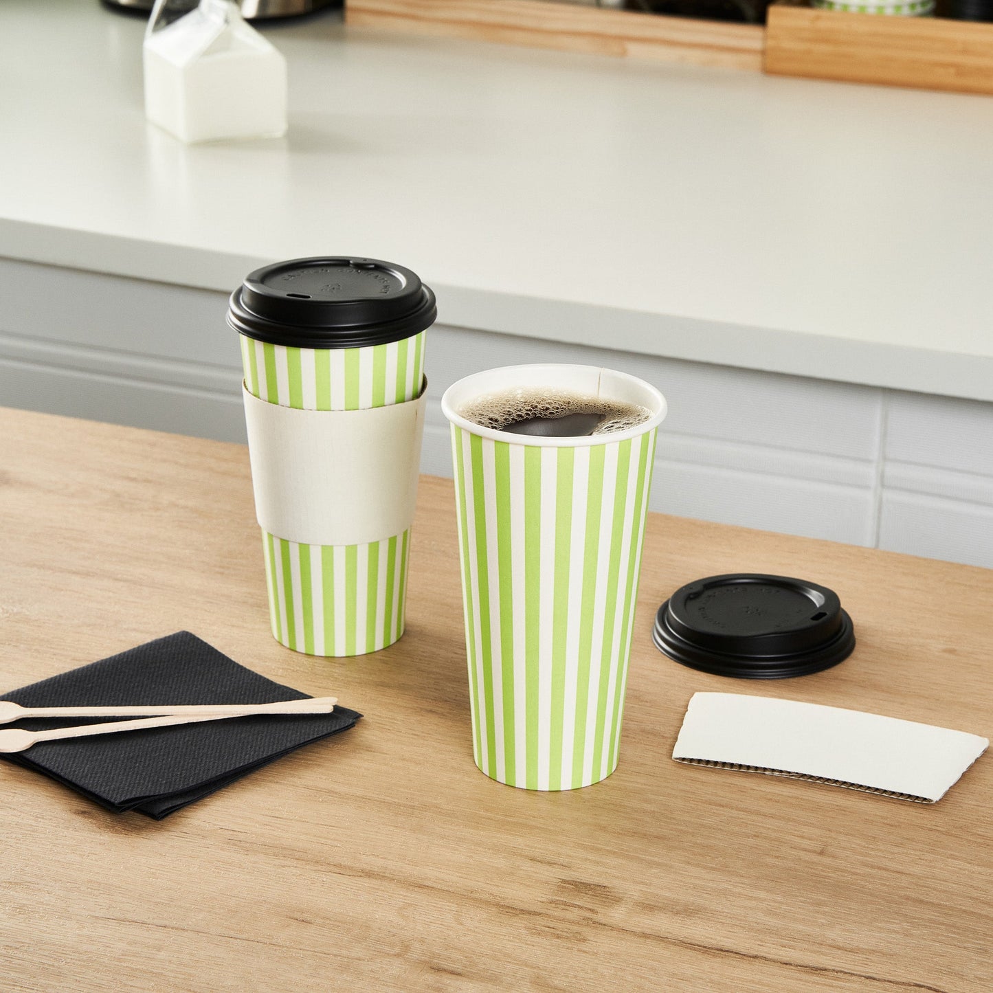 Restpresso 20 oz Green and White Stripe Paper Single Wall Coffee Cup - with Black Lid - 3 1/2"x 3 1/2"x 6 1/4" - 400 count box
