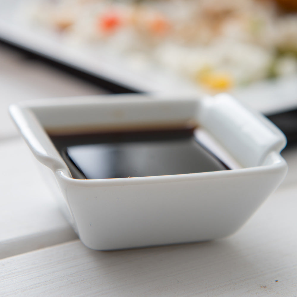 Chef 101 1 oz Square White Porcelain Mini Lipped Handle Bowl - 2 1/2" x 2 1/2" x 1" - 10 count box