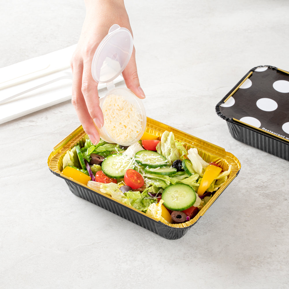Foil Lux 16 oz Rectangle Black and Gold Aluminum Take Out Container - with Polka Dot Paper Lid - 7 1/4" x 5 1/4" x 2" - 200 count box