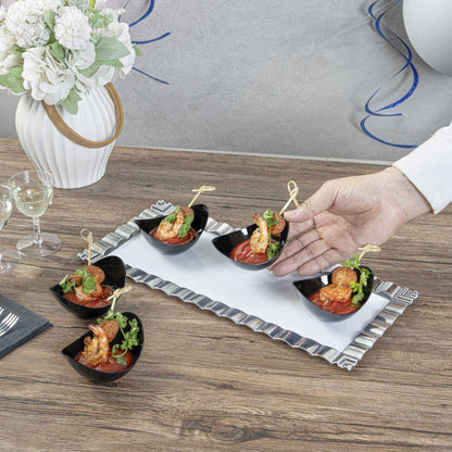 Mini Serve 2 oz Oval Black Plastic Alato Tasting Dish - 3 1/2" x 2 3/4" x 1 3/4" - 100 count box