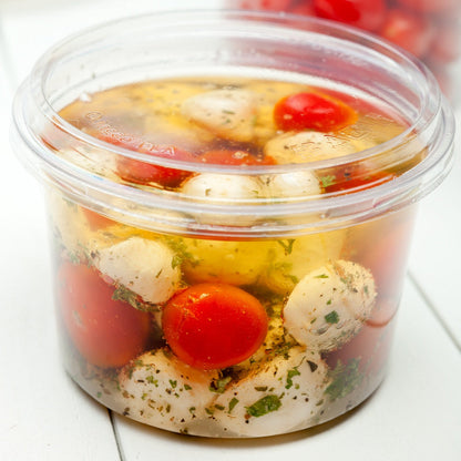 Basic Nature Round Clear Plastic Deli Container Flat Lid - Compostable - 4 1/2" x 4 1/2" x 3/4" - 50 count box