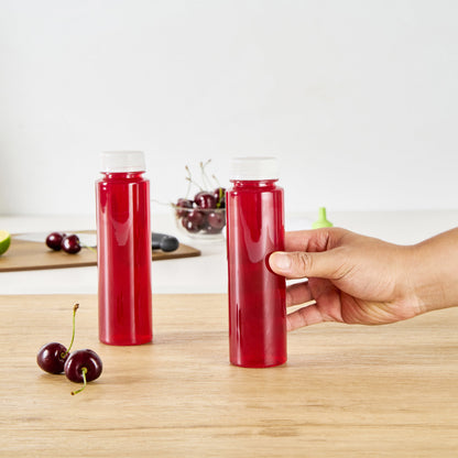 Bottle Tek 8 oz Round Clear Plastic Cold Pressed Juice Bottle - with Safety Cap - 2" x 2" x 6 3/4" - 100 count box