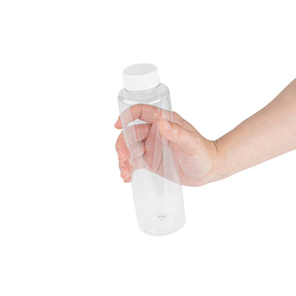Bottle Tek 16 oz Round Clear Plastic Cold Pressed Juice Bottle - with Safety Cap - 2 1/4" x 2 1/4" x 8 1/4" - 100 count box