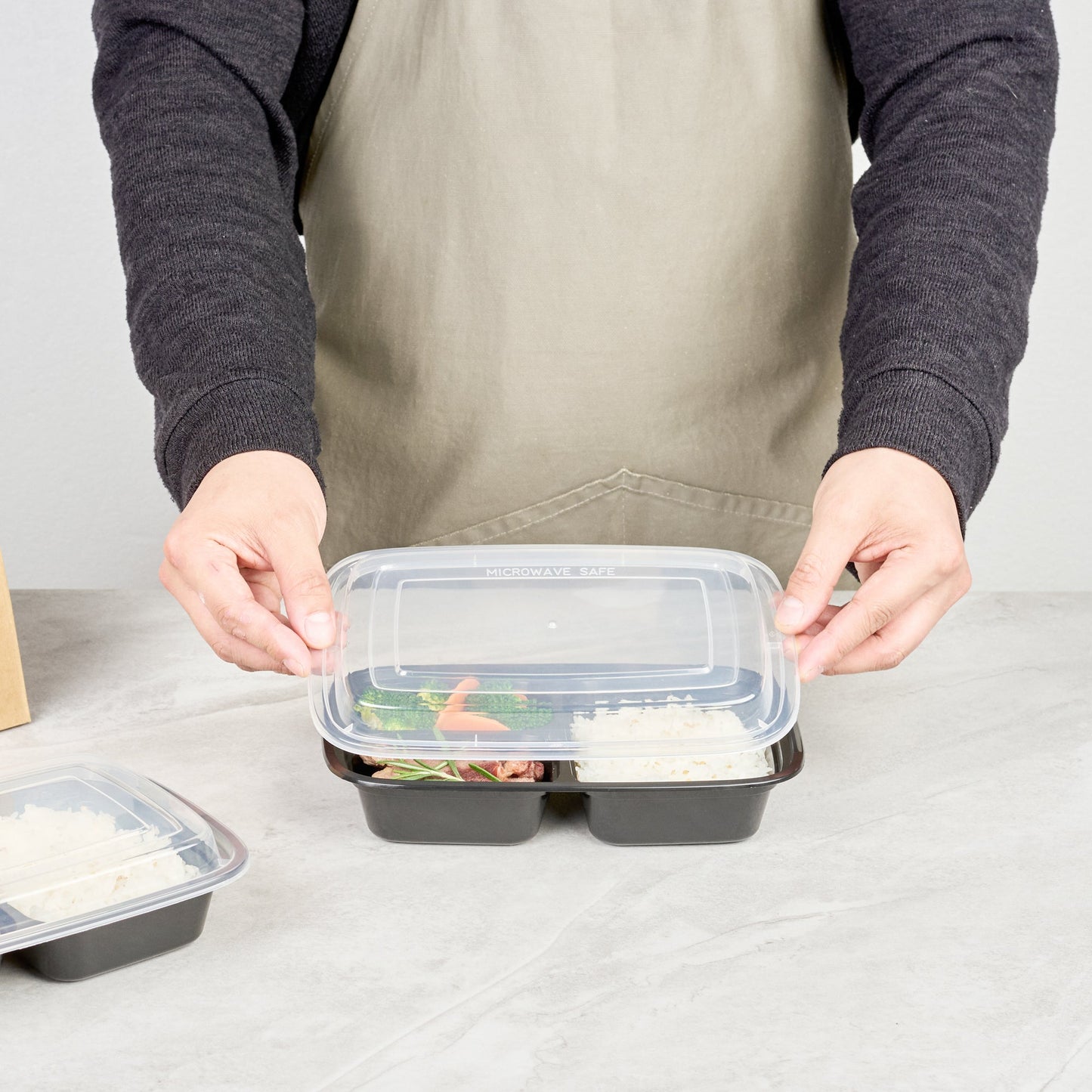 Asporto 26 oz Black Plastic 3 Compartment Food Container - with Clear Lid, Microwavable - 8 3/4" x 6" x 1 3/4" - 100 count box