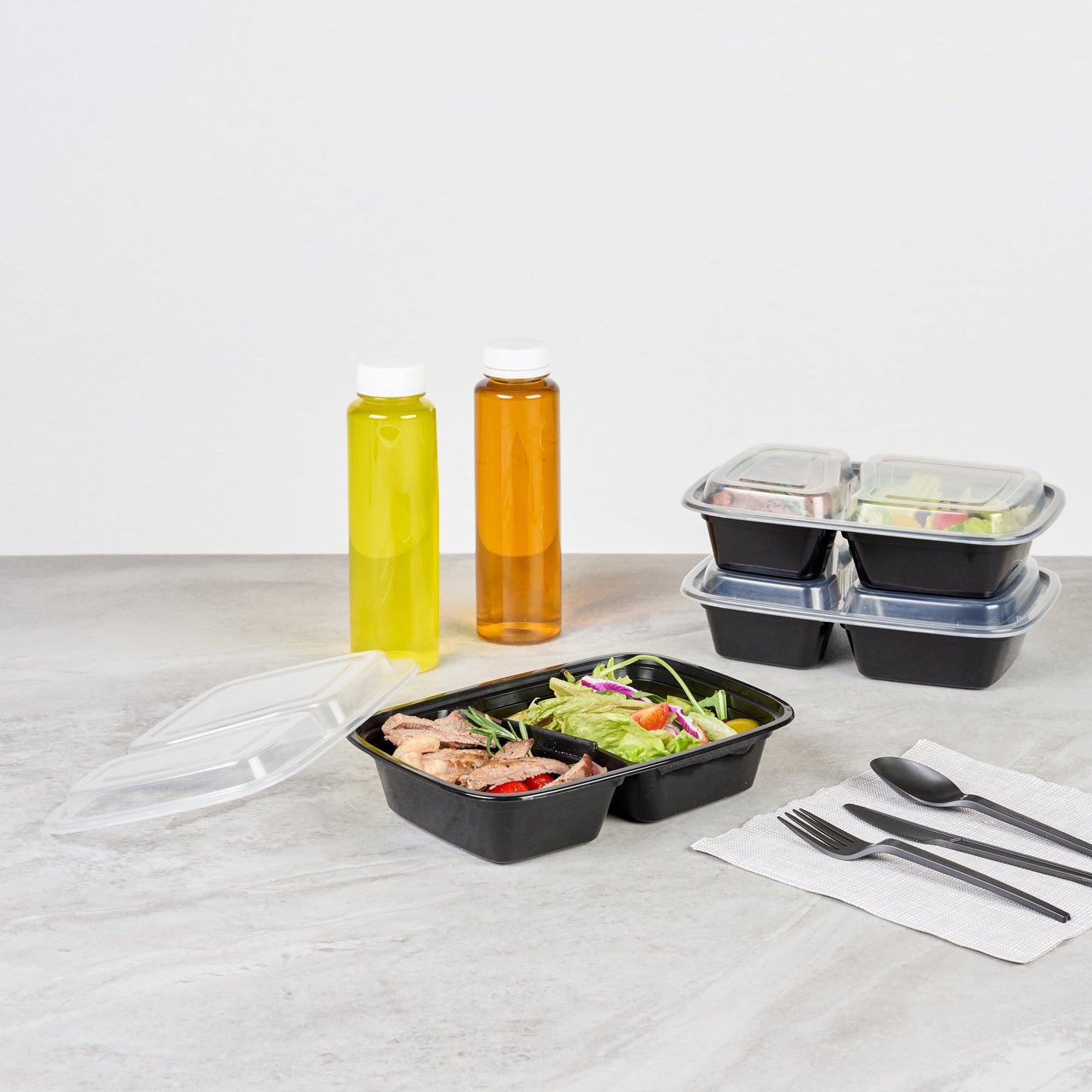 Asporto 32 oz Black Plastic 2 Compartment Food Container - with Clear Lid, Microwavable - 8 3/4" x 6" x 2" - 100 count box