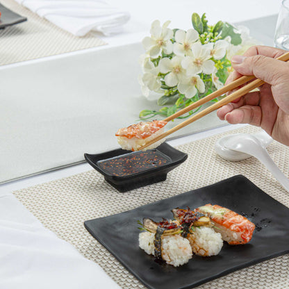 Voga 1 oz Rectangle Black Melamine Sauce Dish - Japonais - 4" x 2 1/2" x 1 1/4" - 10 count box