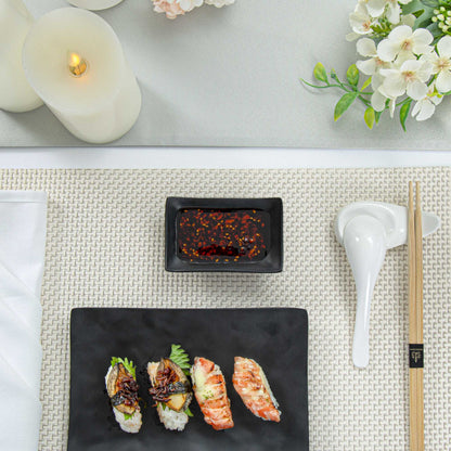 Voga 1 oz Rectangle Black Melamine Sauce Dish - Japonais - 4" x 2 1/2" x 1 1/4" - 10 count box