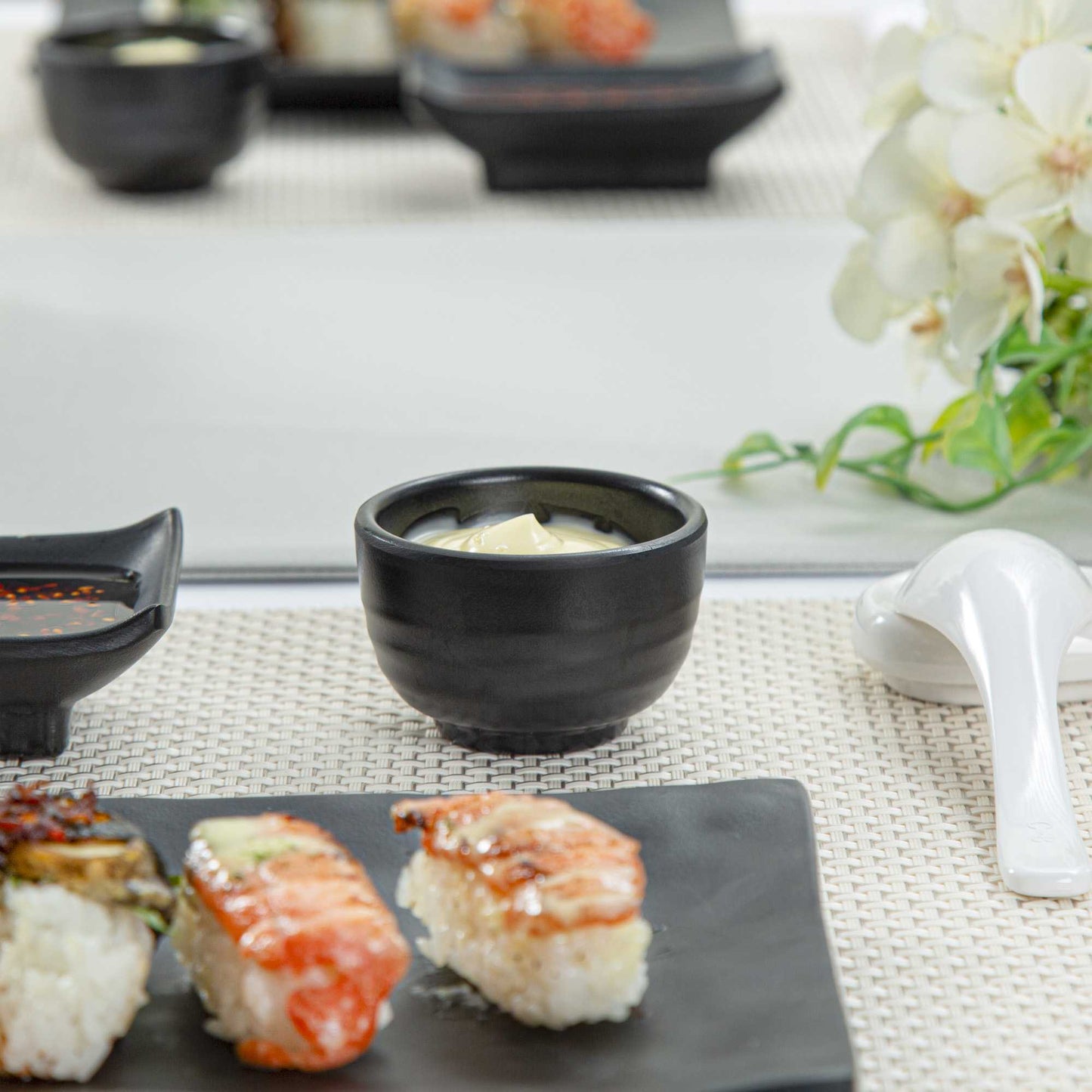 Voga 2 oz Round Black Melamine Condiment Cup - Japonais - 2 1/2" x 2 1/2" x 1 1/2" - 10 count box