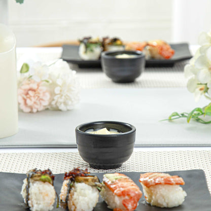 Voga 2 oz Round Black Melamine Condiment Cup - Japonais - 2 1/2" x 2 1/2" x 1 1/2" - 10 count box