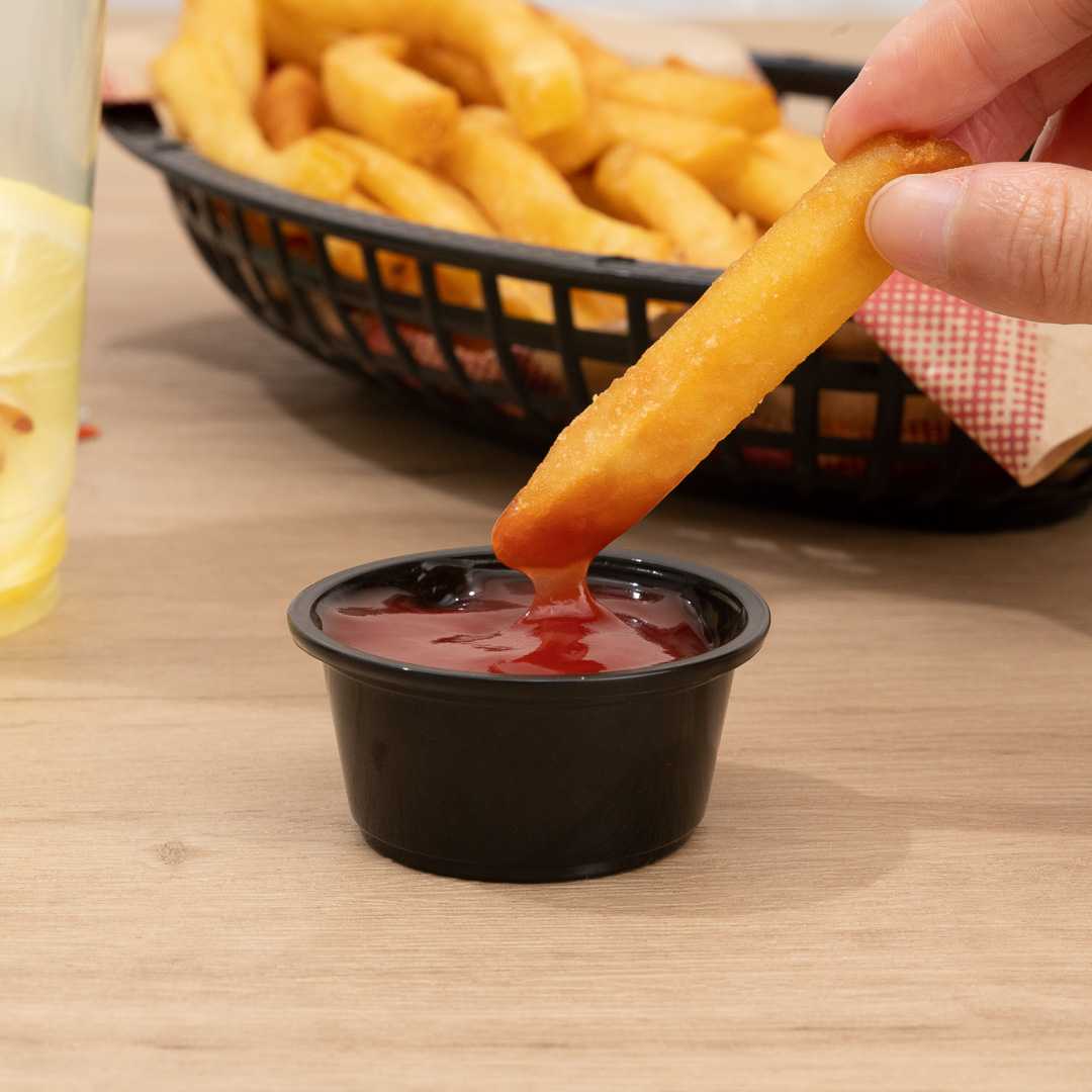Chef 101 2 oz Round Black Plastic Portion Cup - 2 1/2" x 2 1/2" x 1 1/4" - 2000 count box
