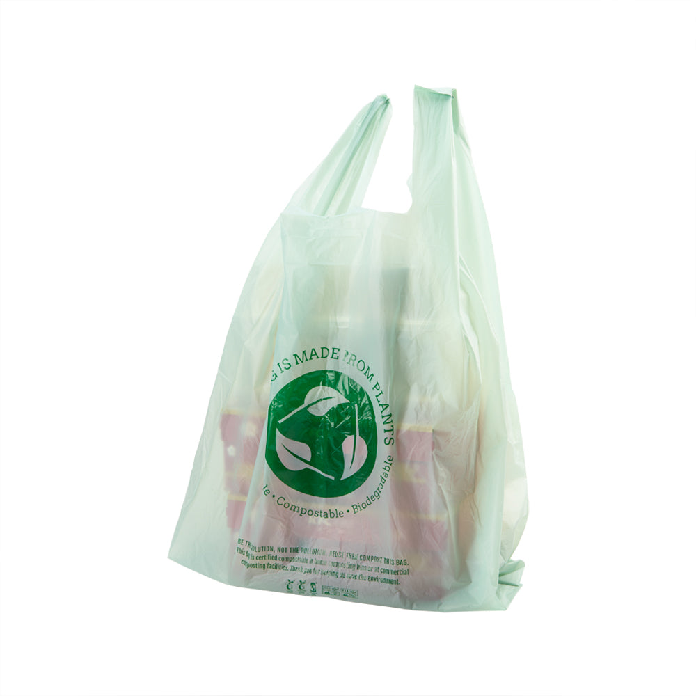 Basic Nature Green Plastic T-Shirt Bag - 1/6 Size, Compostable - 12" x 6 1/2" x 22" - 100 count box