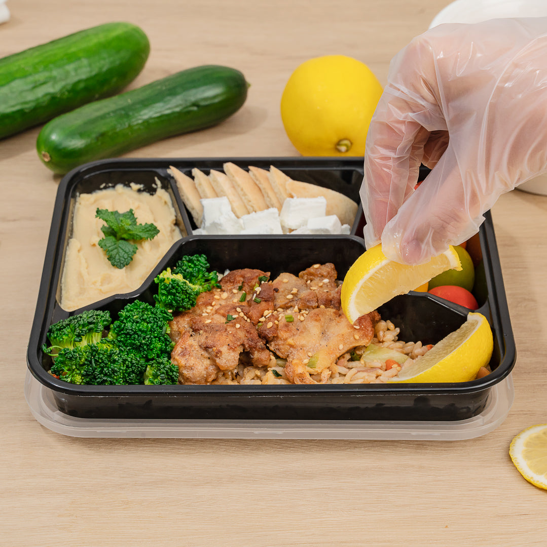 Asporto 34 oz Black Plastic 4 Compartment Food Container - with Clear Lid, Microwavable - 8 3/4" x 7 1/2" x 1 1/2" - 100 count box