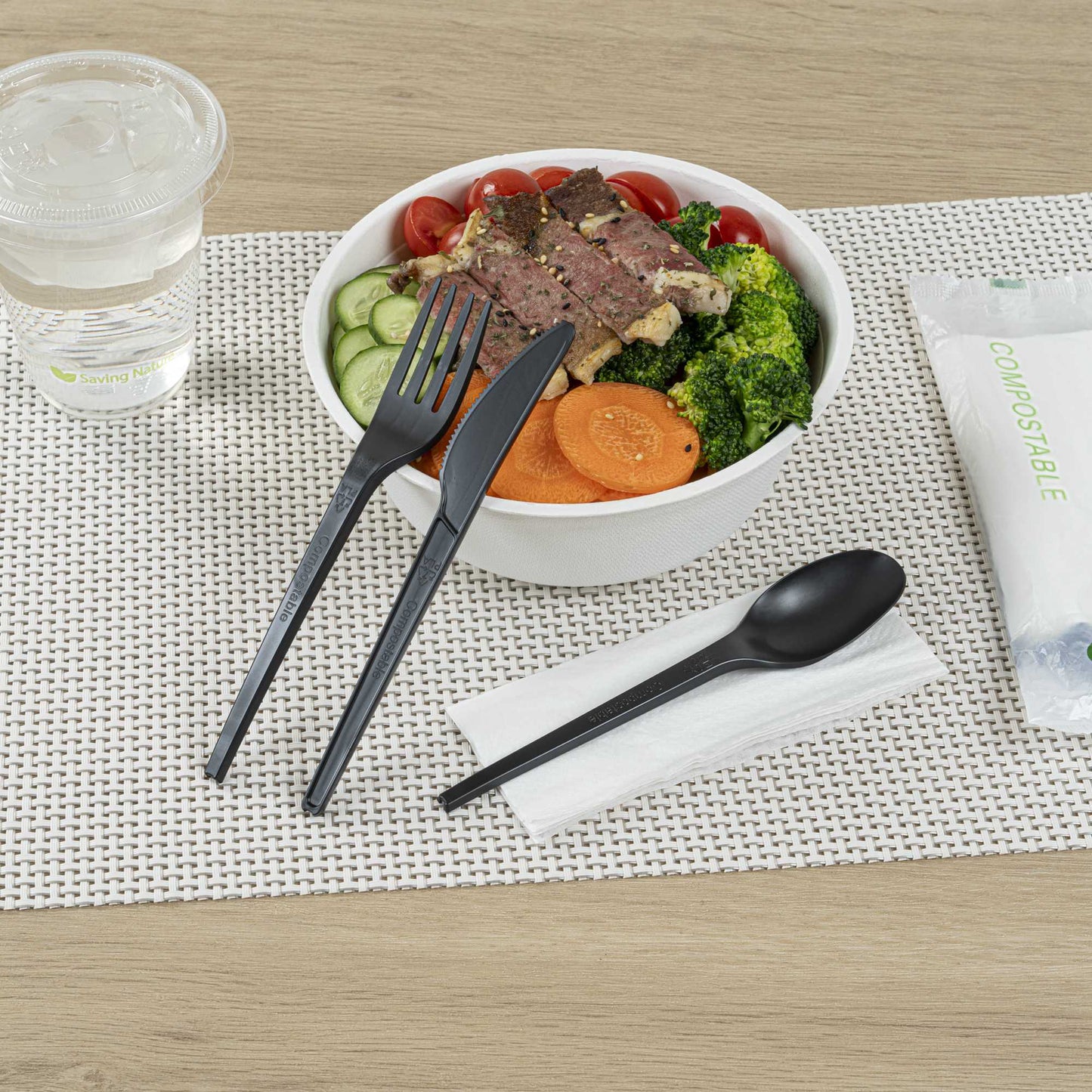 Basic Nature Black CPLA Plastic Cutlery Set - Compostable Wrapper, White Napkin, Heat-Resistant - 6 1/2" - 100 count box