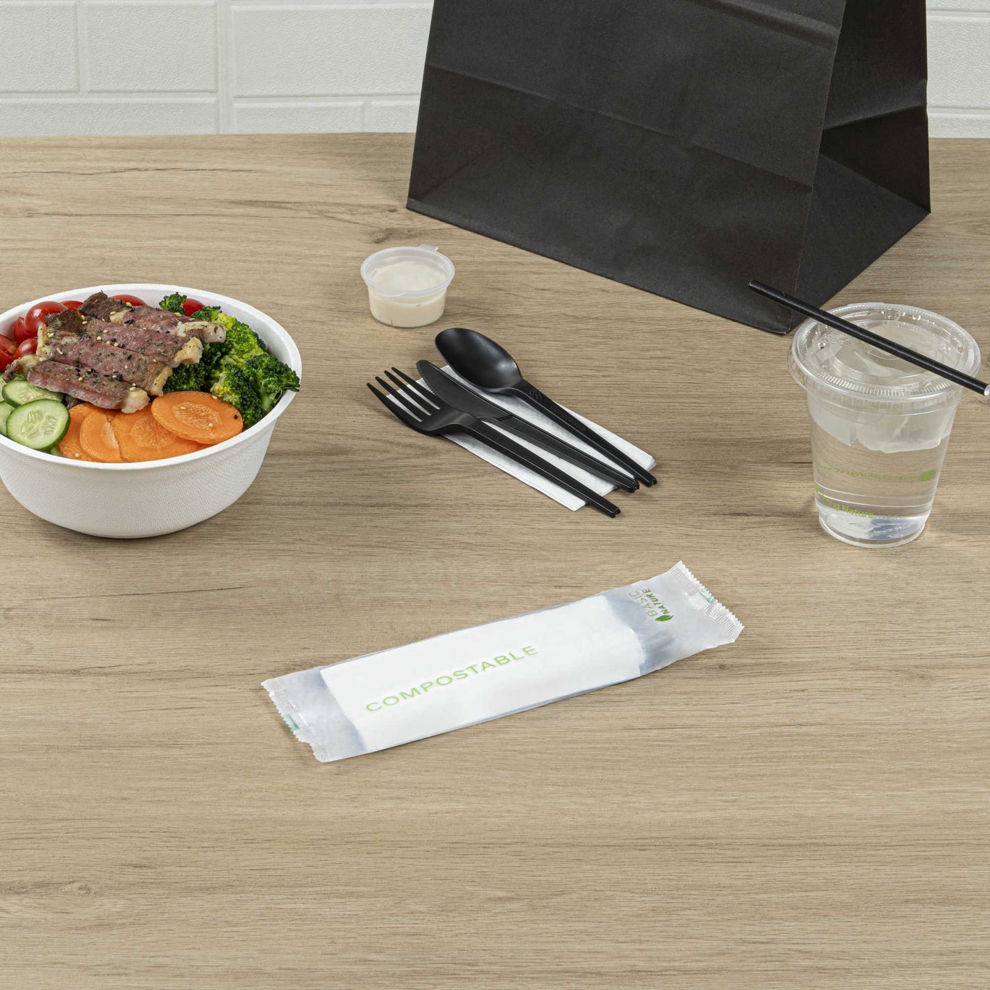 Basic Nature Black CPLA Plastic Cutlery Set - Compostable Wrapper, White Napkin, Heat-Resistant - 6 1/2" - 100 count box