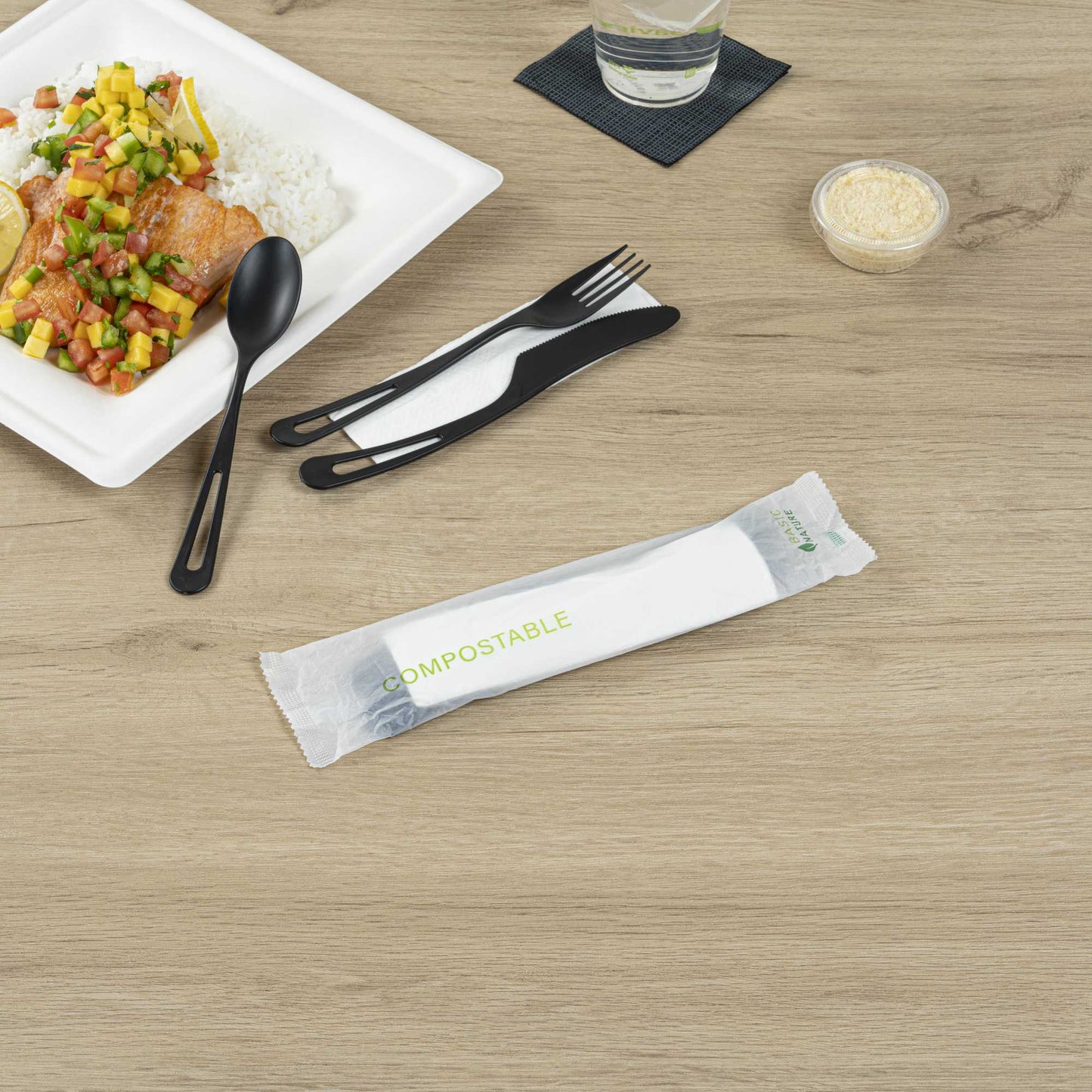 Basic Nature Black CPLA Plastic Cutlery Set - Compostable Wrapper, White Napkin, Heat-Resistant - 7 1/2" - 100 count box